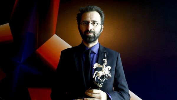 Senaristliğini ve yönetmenliğini Erdem Tepegöz’ün (fotoğrafta) üstlendiği Gölgeler İçinde filmi, 42. Moskova Film Festivali’nde Jüri Özel Ödülünü kazandı. - Sputnik Türkiye