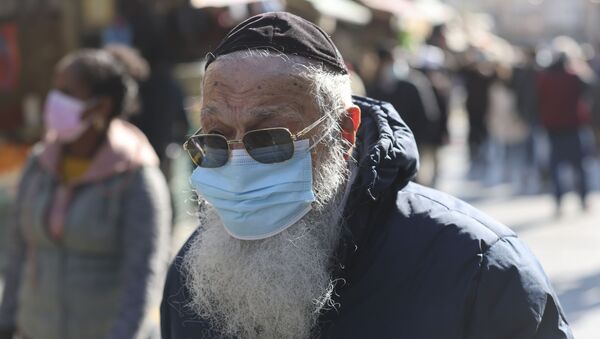 İsrail'de Ultra Ortodoks Yahudiler için maske ayarı - Sputnik Türkiye