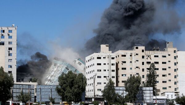 İsrail, Gazze'de uluslararası televizyonların bulunduğu binayı bombaladı - Sputnik Türkiye