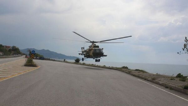 Sahile zorunlu iniş yapan Azerbaycan'ın askeri helikopteri bölgeden ayrıldı - Sputnik Türkiye