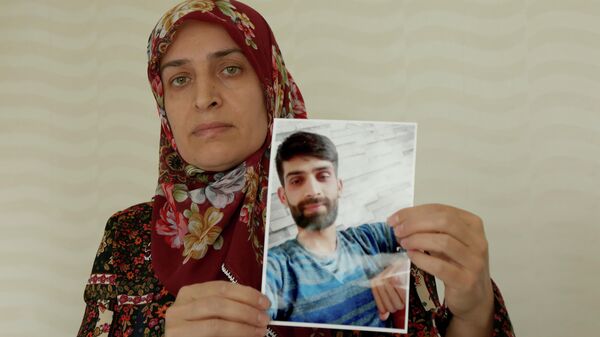 Selde kaybolan oğlundan 77 gündür haber alamayan anne: 'Belki de yaşıyordur' - Sputnik Türkiye