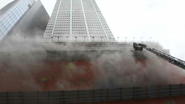 Hong Kong'un Dünya Ticaret Merkezi'nde çıkan yangın - Sputnik Türkiye