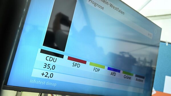Almanya'nın Kuzey Ren-Vestfalya eyaletinde yapılan ve küçük genel seçim olarak nitelendirilen eyalet meclisi seçimlerinin galibi oyların yüzde 35’ini alan Hristiyan Demokratik Birliği (CDU) oldu. - Sputnik Türkiye