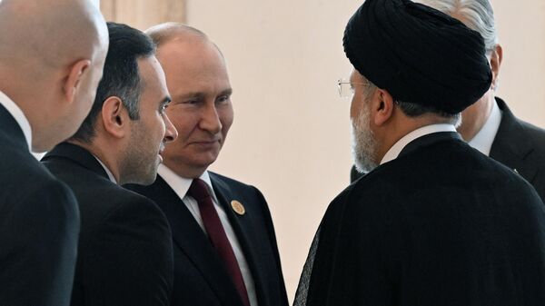 Rusya Devlet Başkanı Vladimir Putin ve İran Cumhurbaşkanı İbrahim Reisi - Sputnik Türkiye