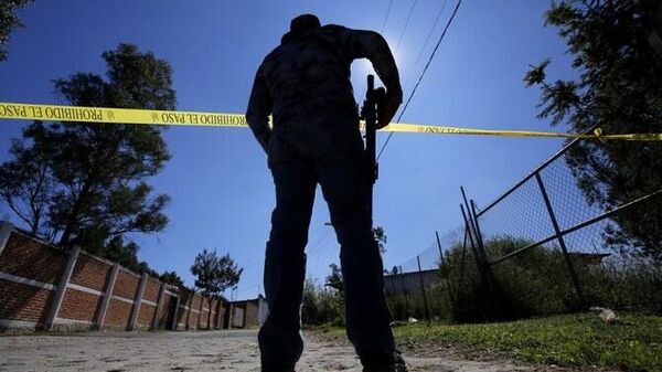 Meksika’nın Jalisco eyaletinde yer alan Zapopan şehri yakınlarındaki bir arazide bulunan toplu mezarda 25 kişinin cesedine ulaşıldı.  - Sputnik Türkiye