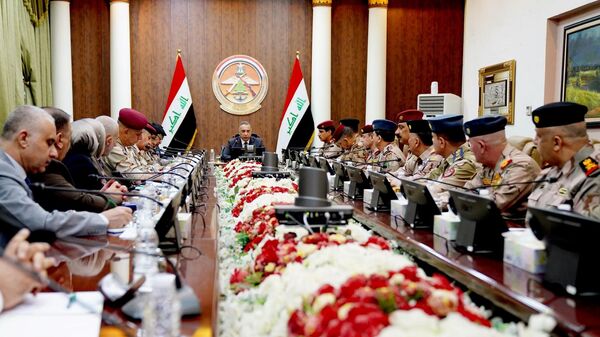 Başbakan Mustafa Kazımi, silahlı kuvvetler ve Savunma Bakanlığı’ndan üst düzey yetkililerin katılımıyla gerçekleştirilen Irak Yüksek Güvenlik Kurulu toplantısına başkanlık etti. - Sputnik Türkiye