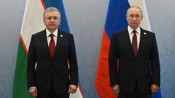 Rusya Devlet Başkanı Vladimir Putin ve Özbekistan Cumhurbaşkanı Şevket Mirziyoyev - Sputnik Türkiye