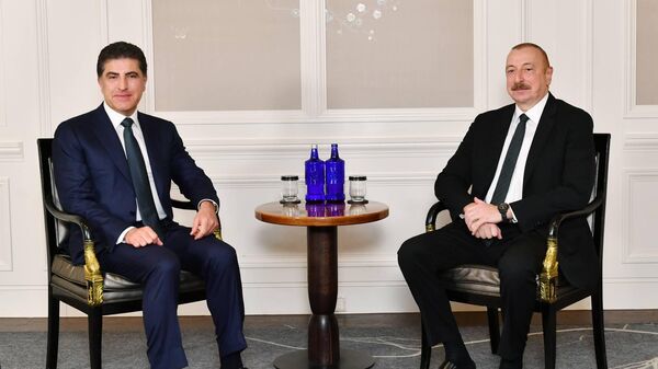 Azerbaycan Cumhurbaşkanı İlham Aliyev ile Irak Kürt Bölgesel Yönetimi (IKBY) Başkanı Neçirvan Barzani Münih'te bir araya geldi. - Sputnik Türkiye