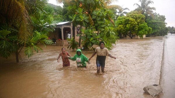 Haiti’de etkili olan şiddetli yağışlar nedeniyle meydana gelen sel ve heyelanda hayatını kaybedenlerin sayısı 40'ı geçti. - Sputnik Türkiye
