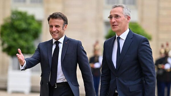 Fransa Cumhurbaşkanı Emmanuel Macron ve NATO Genel Sekreteri Jens Stoltenberg, 11-12 Temmuz'da Vilnius'ta düzenlenecek NATO Zirvesi'nde İttifakın savunma ve caydırıcılık konularının ön plana çıkacağına işaret etti. - Sputnik Türkiye