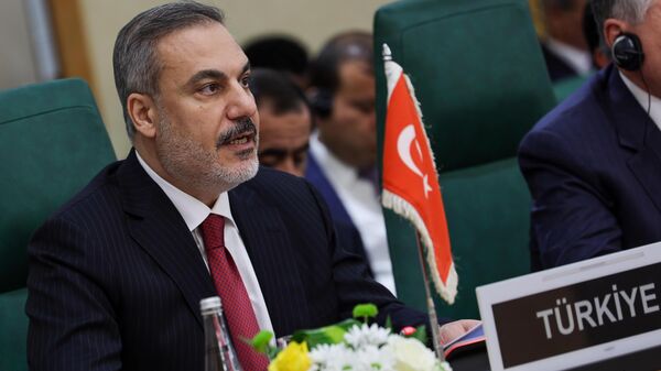Dışişleri Bakanı Hakan Fidan, İslam İşbirliği Teşkilatı ve Arap Ligi Olağanüstü Ortak Zirvesi Dışişleri Bakanları Konseyi Toplantısı'na katıldı. - Sputnik Türkiye