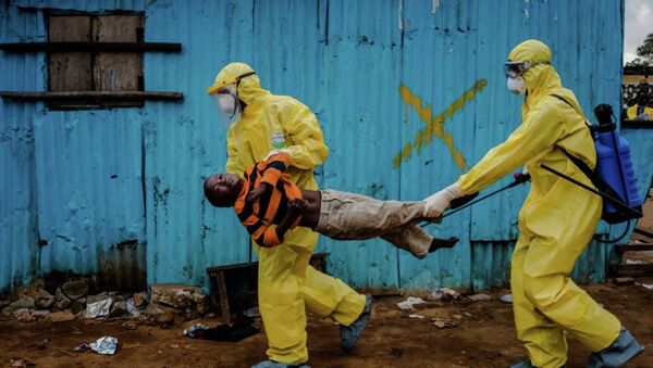 Daniel Berehulak, Ebola salgınında Liberya’da çektiği fotoğrafla Pulitzer kazandı. - Sputnik Türkiye
