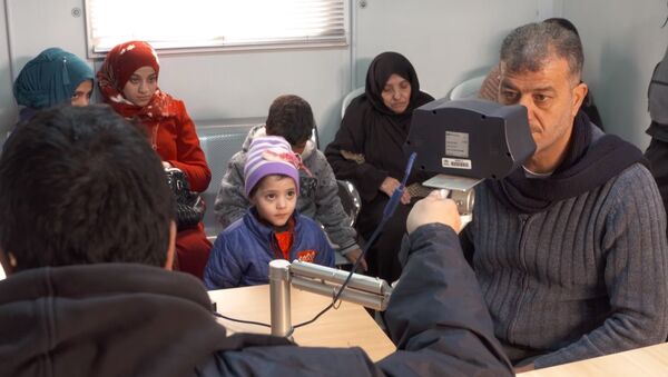 Ürdün’de Suriyeli sığınmacılara yardımları düzenlemek amacıyla göz taraması uygulaması başladı. - Sputnik Türkiye