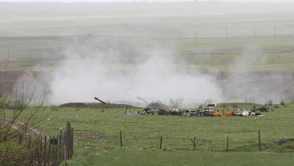 An Armenian artillery unit is seen in the town of Martakert, where clashes with Azeri forces are taking place, in Nagorno-Karabakh region, which is controlled by separatist Armenians, April 3, 2016. - Sputnik Türkiye