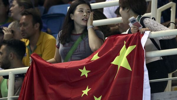 Olimpiyat Oyunları'nı izleyen Çinli taraftarlar - Sputnik Türkiye