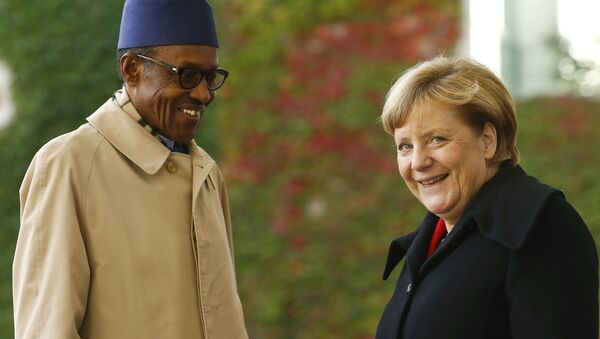 Nijerya Devlet Başkanı Muhammed Buhari- Almanya Başbakanı Angela Merkel - Sputnik Türkiye