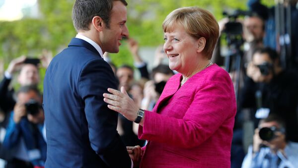Fransa Cumhurbaşkanı Emmanuel Macron ve Almanya BaşbakanI Angela Merkel - Sputnik Türkiye