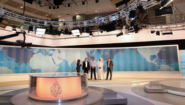 Al-Jazeera channel's newsroom in Doha - Sputnik Türkiye
