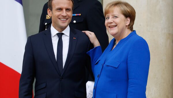 Fransa Cumhurbaşkanı Emmanuel Macron, Almanya Başbakanı Angela Merkel - Sputnik Türkiye