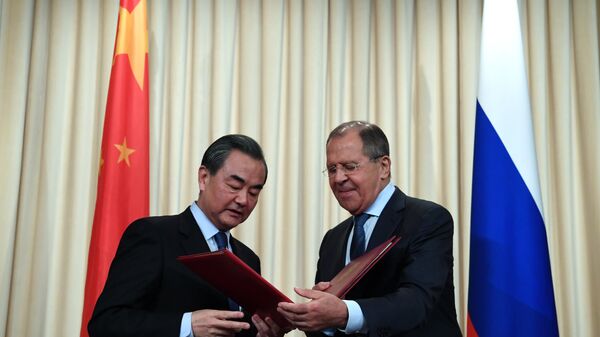 Rusya Dışişleri Bakanı Sergey Lavrov ve Çin Dışişleri Bakanı Wang Yi, - Sputnik Türkiye