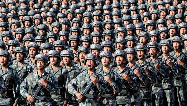 Soldiers of China's People's Liberation Army (PLA) get ready for the military parade to commemorate the 90th anniversary of the foundation of the army at Zhurihe military training base in Inner Mongolia Autonomous Region, China, July 30, 2017 - Sputnik Türkiye