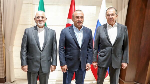Dışişleri Bakanı Mevlüt Çavuşoğlu, Rusya Dışişleri Bakanı Sergey Lavrov ve İran Dışişleri Bakanı Muhammed Cevad Zarif - Sputnik Türkiye
