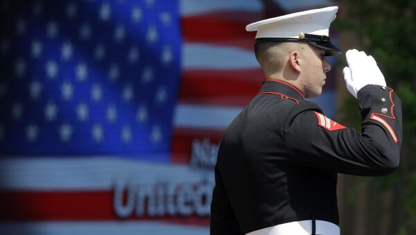 An officer of the US Marine Corps Color Guard stands at attention during the flag raising ceremony at the official opening of the National Day USA, at the Expo 2015 world's fair in Rho, near Milan, Italy, Saturday, July 4, 2015. - Sputnik Türkiye
