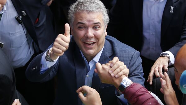 Demokratik Merkez Parti adayı Ivan Duque Kolombiya Devlet Başkanlığı seçimini kazandı - Sputnik Türkiye