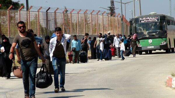 Bayram ziyaretine giden 30 bini aşkın Suriyeli döndü - Sputnik Türkiye
