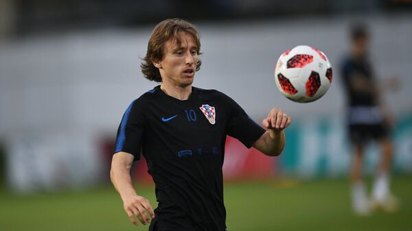 Hırvat oyuncu Luka Modric, Hırvatistan ile Rusya maçından önce, antrenman yaparken - Sputnik Türkiye