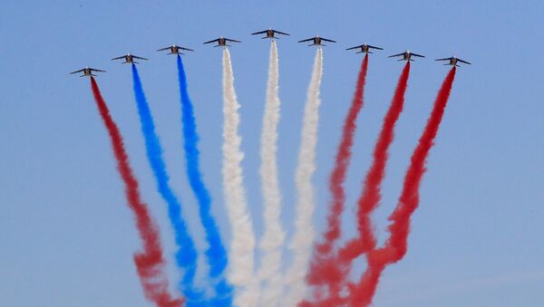 Alpha jets from the French Air Force Patrouille de France fly during the traditional Bastille Day military parade on the Champs-Elysees Avenue in Paris, France, July 14, 2018 - Sputnik Türkiye