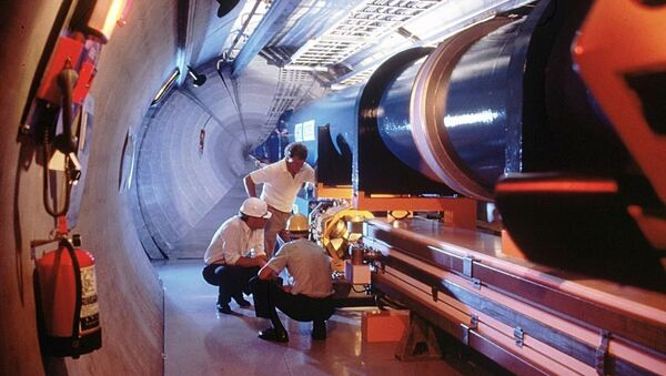 An undated picture released by the CERN, European Council for Nuclear Research, shows a mock-up of the Large Hadron Collidor or LHC atom-smasher which is to be built in an existing 27 kilometers tunnel near Geneva - Sputnik Türkiye