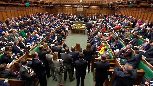 Britain's Prime Minister Theresa May addresses the House of Commons on her government's reaction to the poisoning of former Russian intelligence officer Sergei Skripal and his daughter Yulia in Salisbury, in London, March 14, 2018 - Sputnik Türkiye