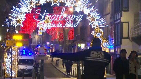 In this image made from video, emergency services arrive on the scene of a Christmas market in Strasbourg, France, Tuesday, Dec. 11, 2018 - Sputnik Türkiye
