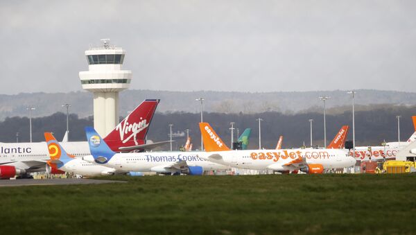 Airplanes stand idle at London's Gatwick Airport, England - Sputnik Türkiye