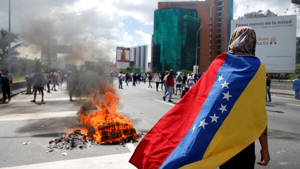 Venezüella’da devlet başkanı Nicolas Maduro’ya karşı düzenlenen gösteriler - Sputnik Türkiye