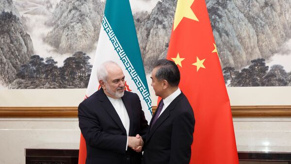 Çin Devlet Müşaviri ve Dışişleri Bakanı Vang Yi, başkent Pekin’de temaslarda bulunan İran Dışişleri Bakanı Cevad Zarif ile görüştü.  - Sputnik Türkiye