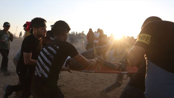 İsrail ablukası altındaki Gazze Şeridi sınırında düzenlenen 'Büyük Dönüş Yürüyüşü' gösterilerine müdahale - Sputnik Türkiye