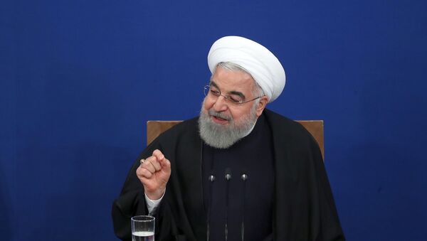 İran Cumhurbaşkanı Hasan Ruhani, başkent Tahran'da düzenlediği basın toplantısında, gündeme ilişkin açıklamalarda bulundu, soruları yanıtladı. - Sputnik Türkiye