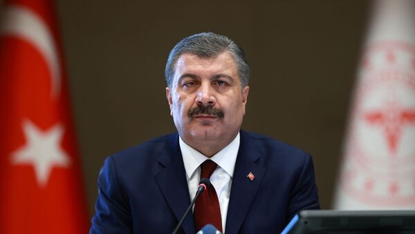 Sağlık Bakanı Fahrettin Koca, video konferans ile katıldığı Koronavirüs Bilim Kurulu toplantısı sonrası düzenlenen basın toplantısında açıklamalarda bulundu. - Sputnik Türkiye